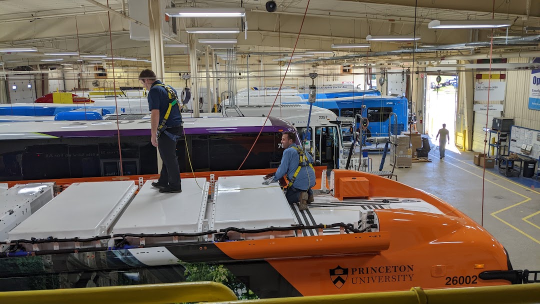 Inspecting a Princeton electric bus